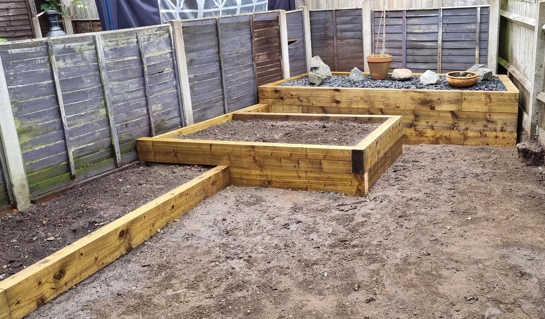 Garden landscaping project. Custom made raised beds using softwood sleepers. All work completed by MJA Garden Landscaping, Farlington, Portsmouth.